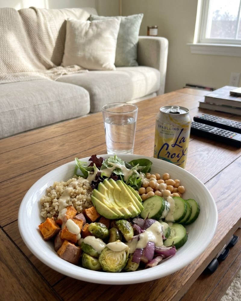 Weight loss friendly girl dinner bowl with quinoa chickpeas vegetables and avocado