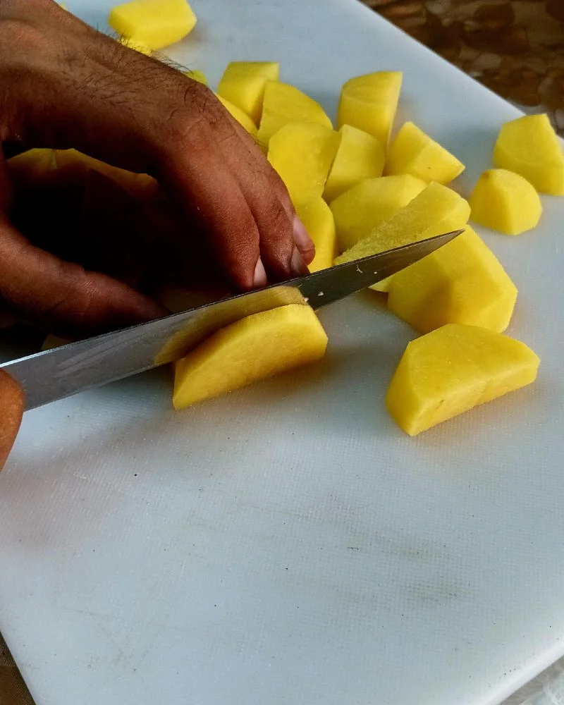 Dice the potatoes into roughly 1-inch cubes.