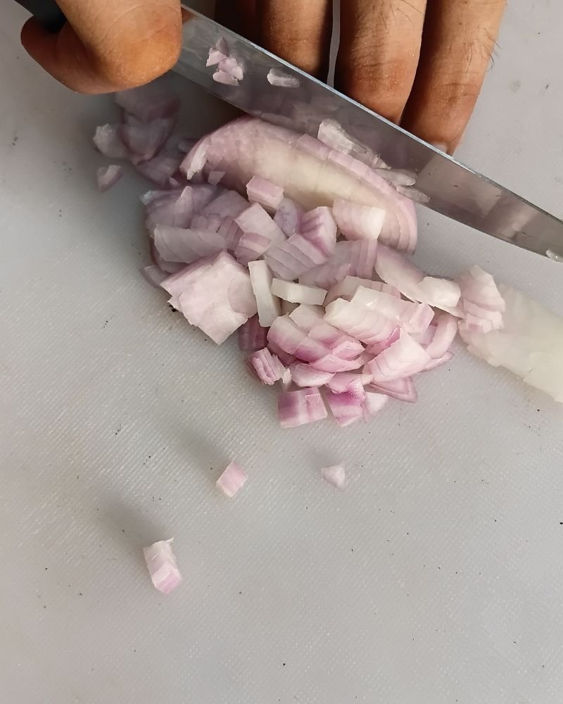 Finely chop the onion into small pieces.